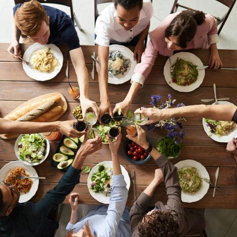 Group of people making a toast 