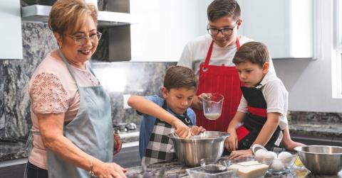 Women baking with grandchildren - photo by Los Muertos Crew