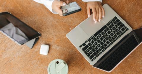 image of person using laptop phone and tablet